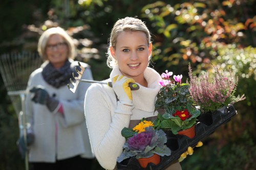 Professional gardeners in Gidea Park following safety procedures